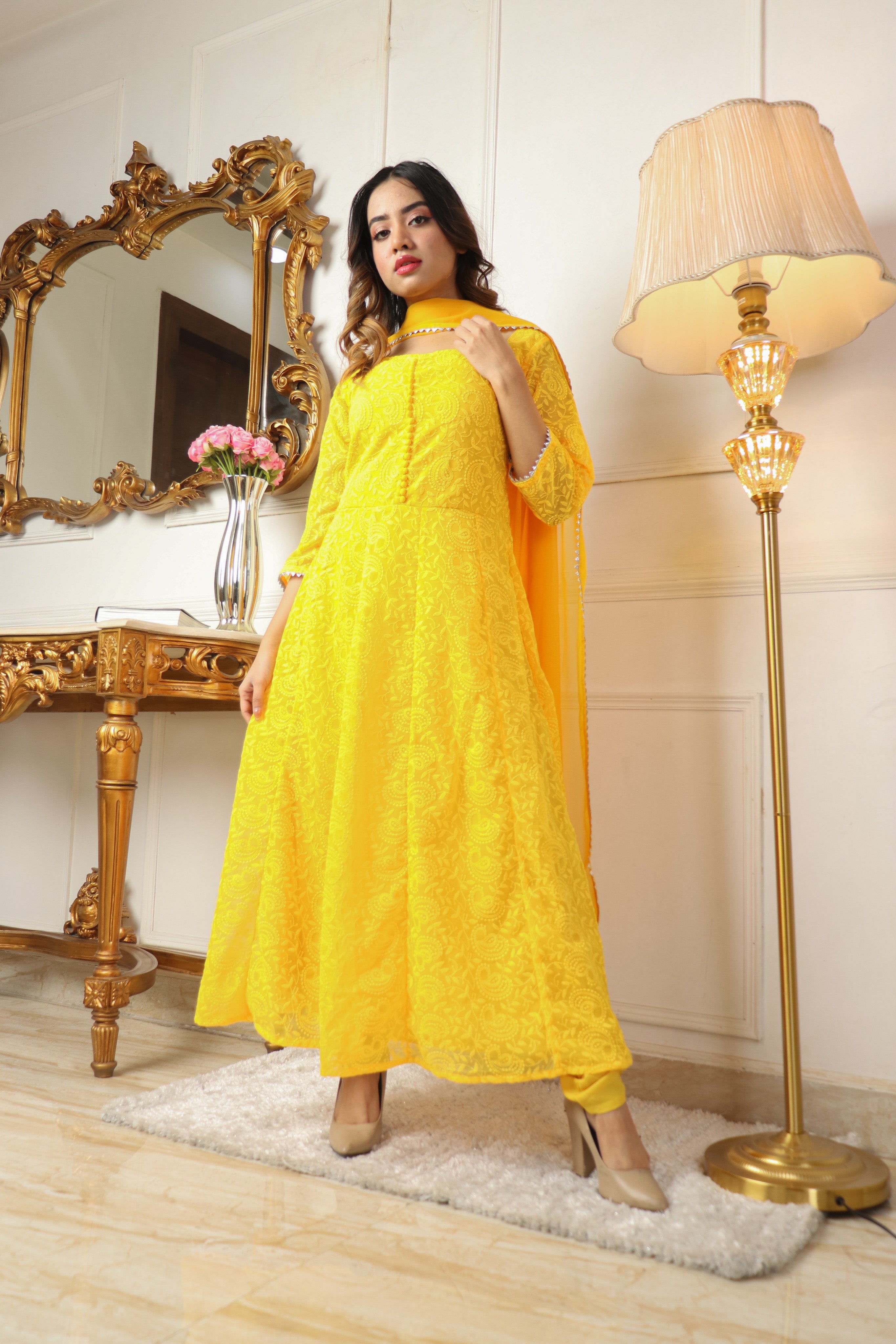 YELLOW COLORED BEAUTIFULL EMBROIDERY FLOOR TOUCH GOWN