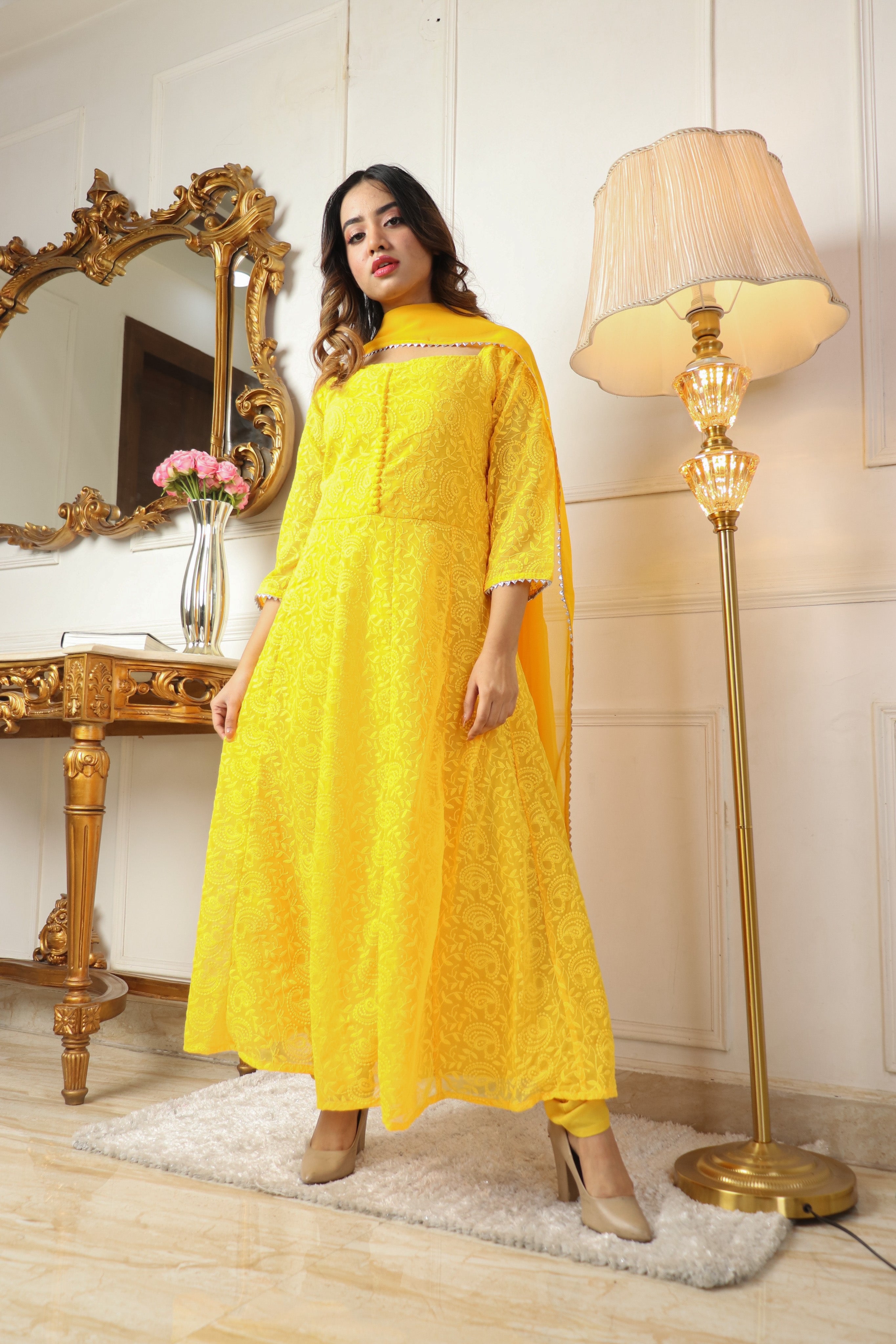 YELLOW COLORED BEAUTIFULL EMBROIDERY FLOOR TOUCH GOWN