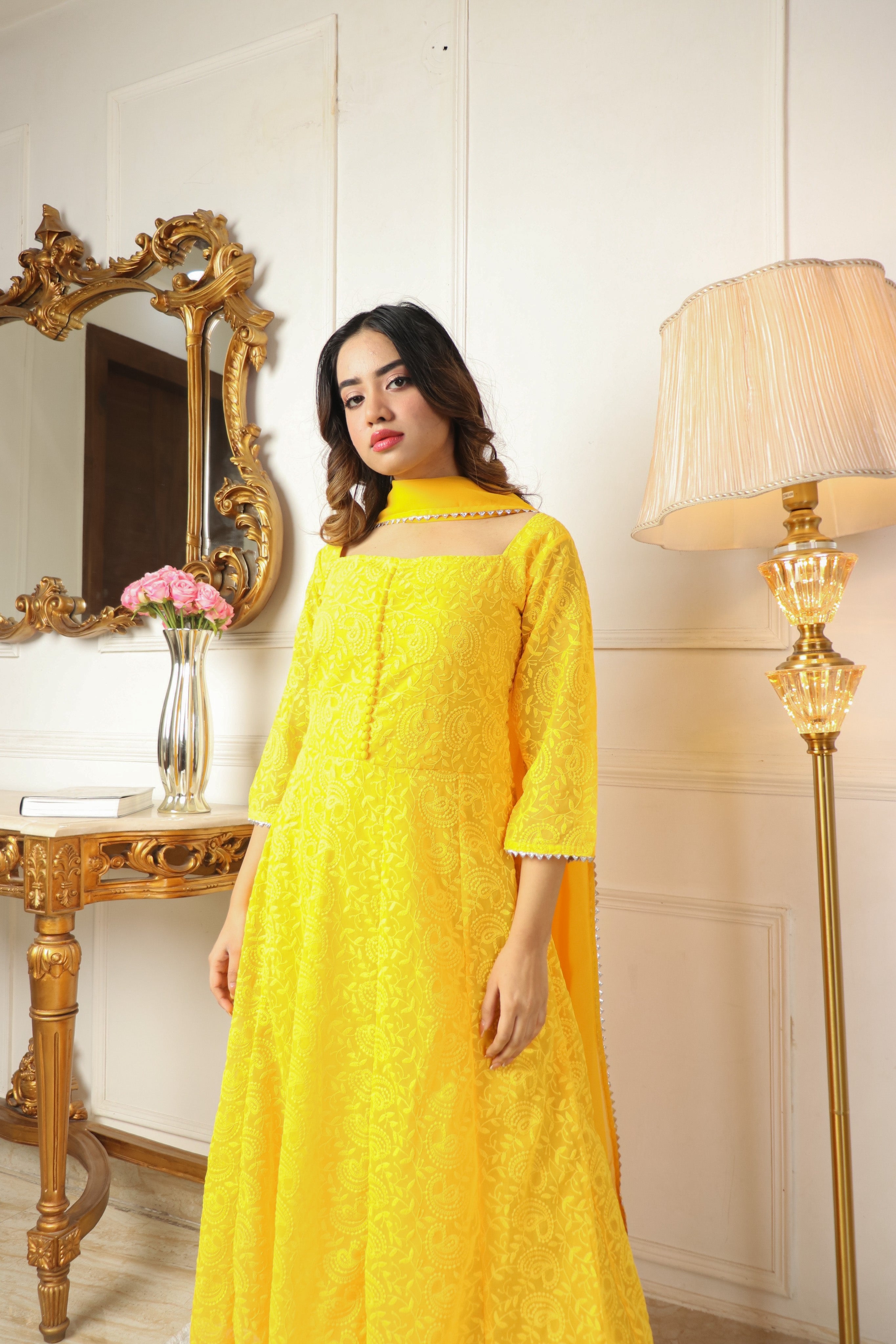 YELLOW COLORED BEAUTIFULL EMBROIDERY FLOOR TOUCH GOWN