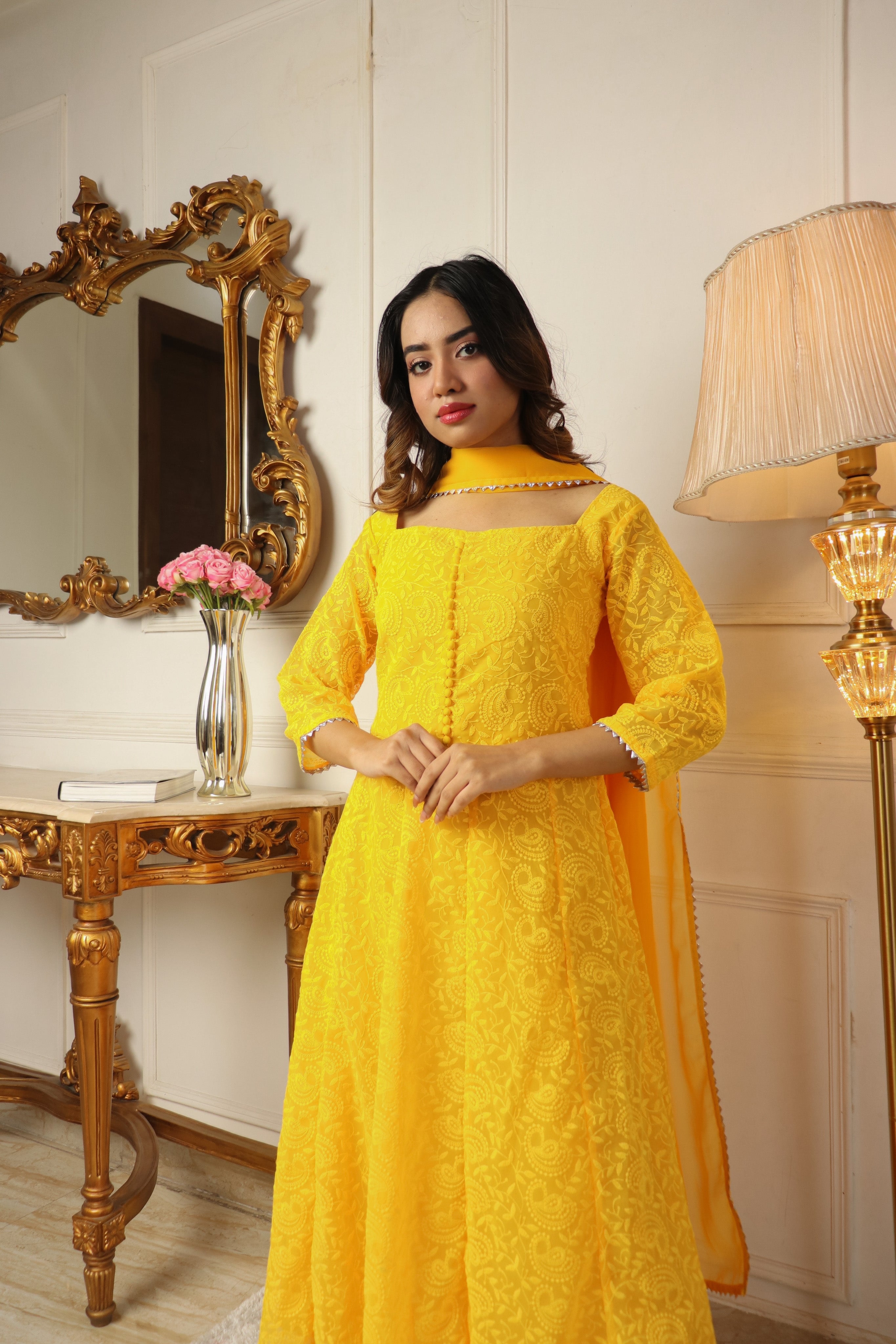 YELLOW COLORED BEAUTIFULL EMBROIDERY FLOOR TOUCH GOWN