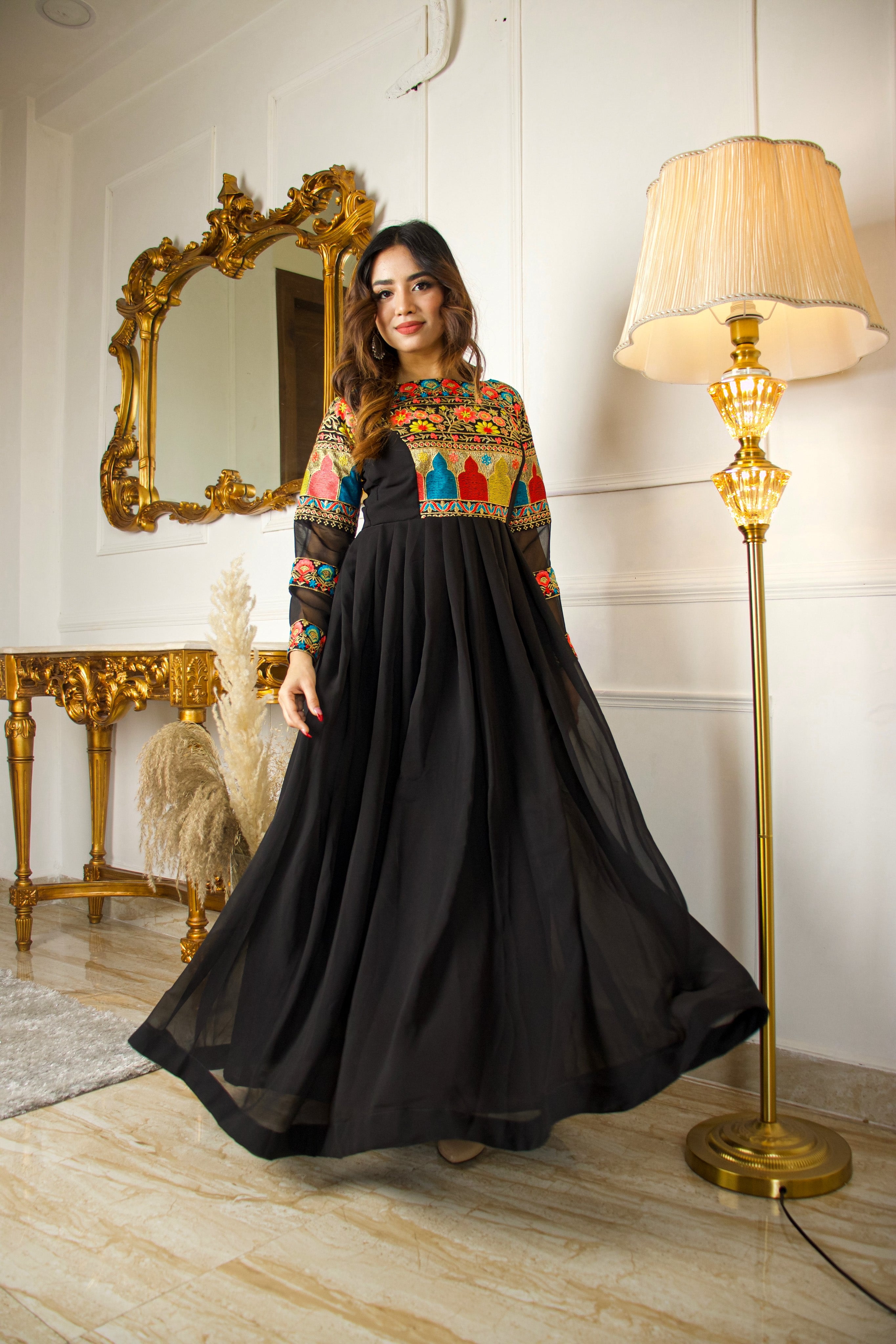 ARRESTING BLACK COLORED BEAUTIFULL EMBROIDERY FLOOR TOUCH GOWN