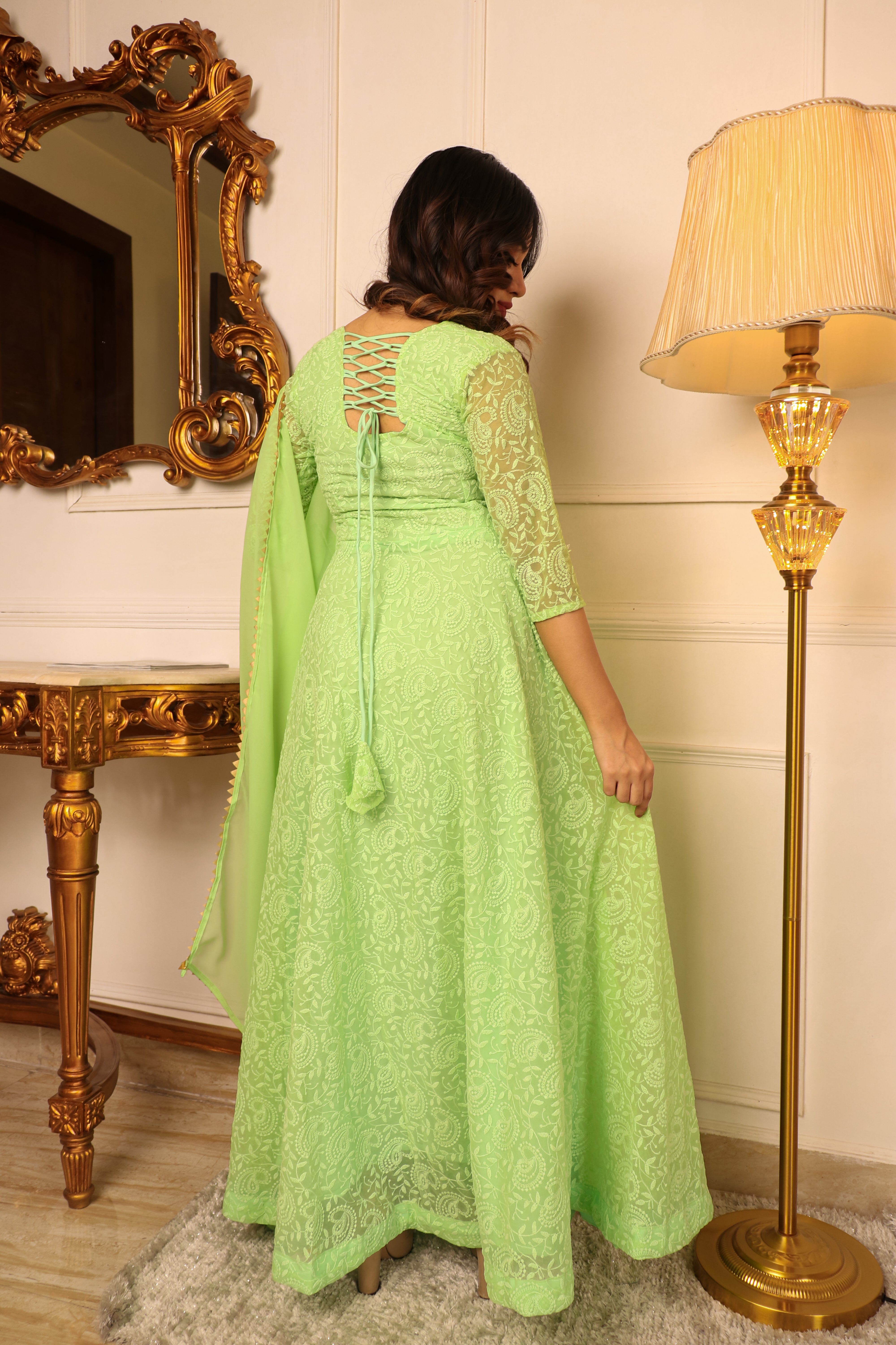 ELEGANT PISTA GREEN COLORED CHIKANKARI FLOOR TOUCH GOWN