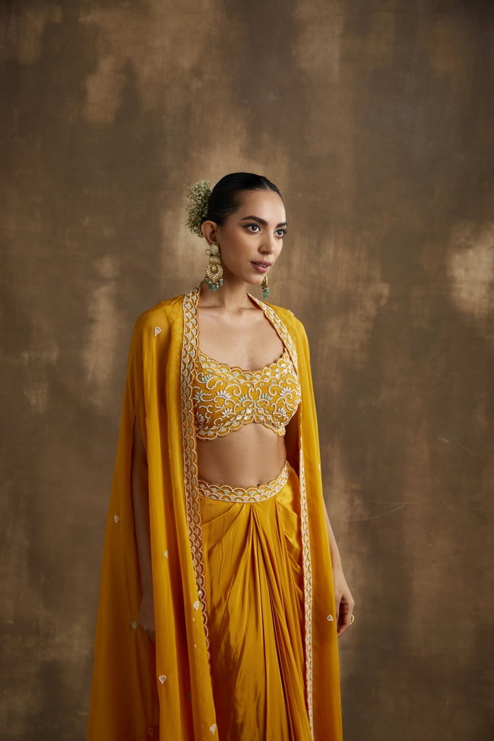 Yellow draped skirt with embroidered crop top & cape